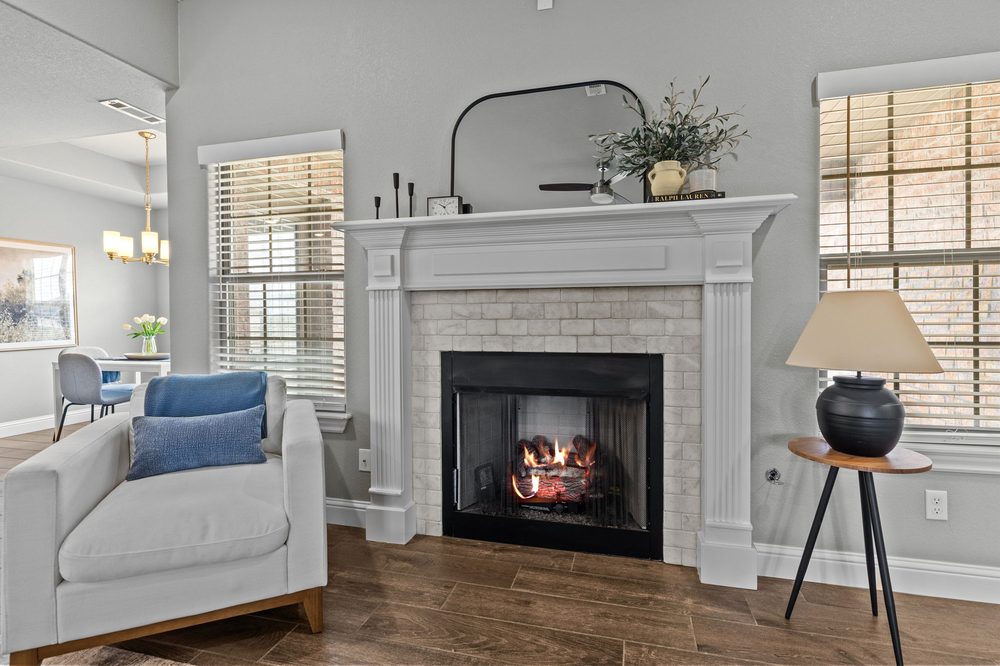Living room fireplace with fire edited in