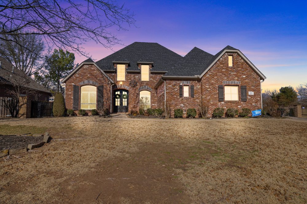 Virtual twilight exterior with dusk sky and glowing windows